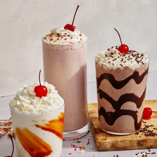 Milkshake recipes in three glasses in different flavors.