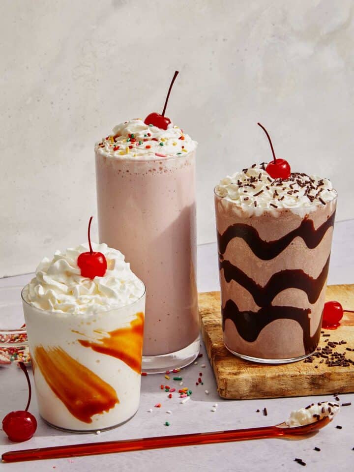 Milkshake recipes in three glasses in different flavors.