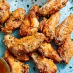 Air fryer chicken wings on a platter.