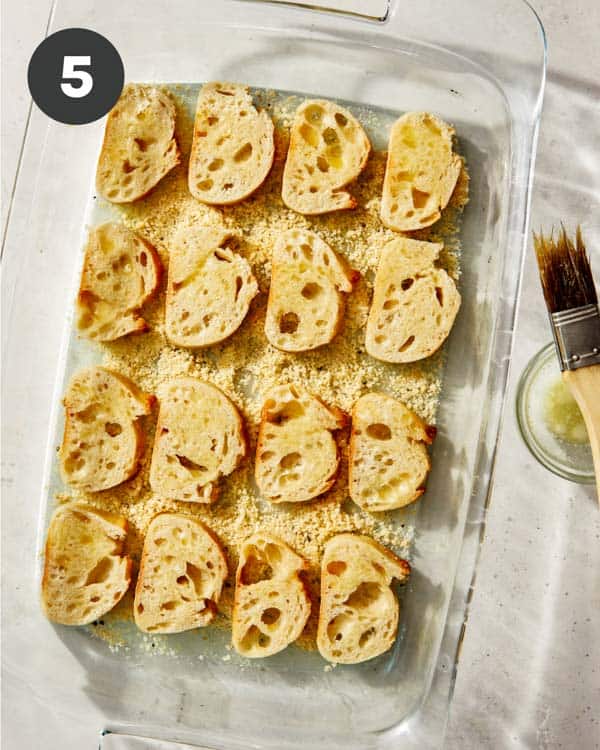 Parmesan crostini brushed with oil.