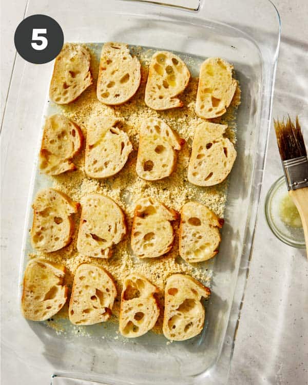 Parmesan crostini brushed with oil. 