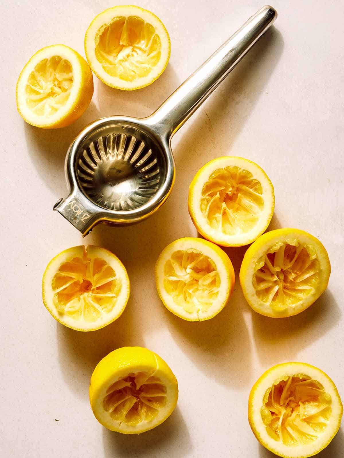 Squeezing lemons for lemonade.