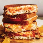 A classic tuna melt recipe cut in half and stacked.