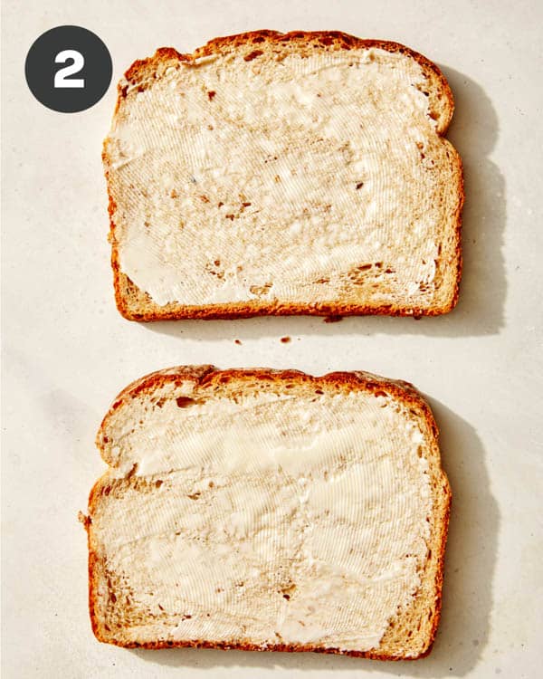 Tuna melt with butter spread on the bread.