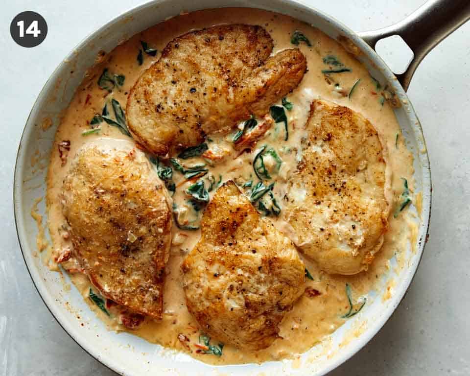 Tuscan chicken in a skillet ready to be served.