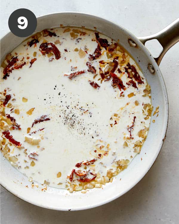 Cream with onions and sun dried tomatoes in a skillet to make Tuscan Chicken.