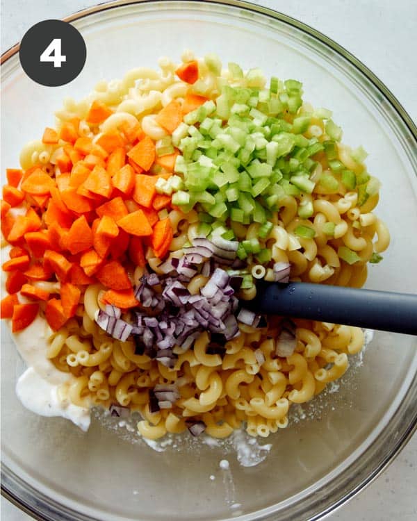 Hawaiian style macaroni salad ingredients in a bowl.