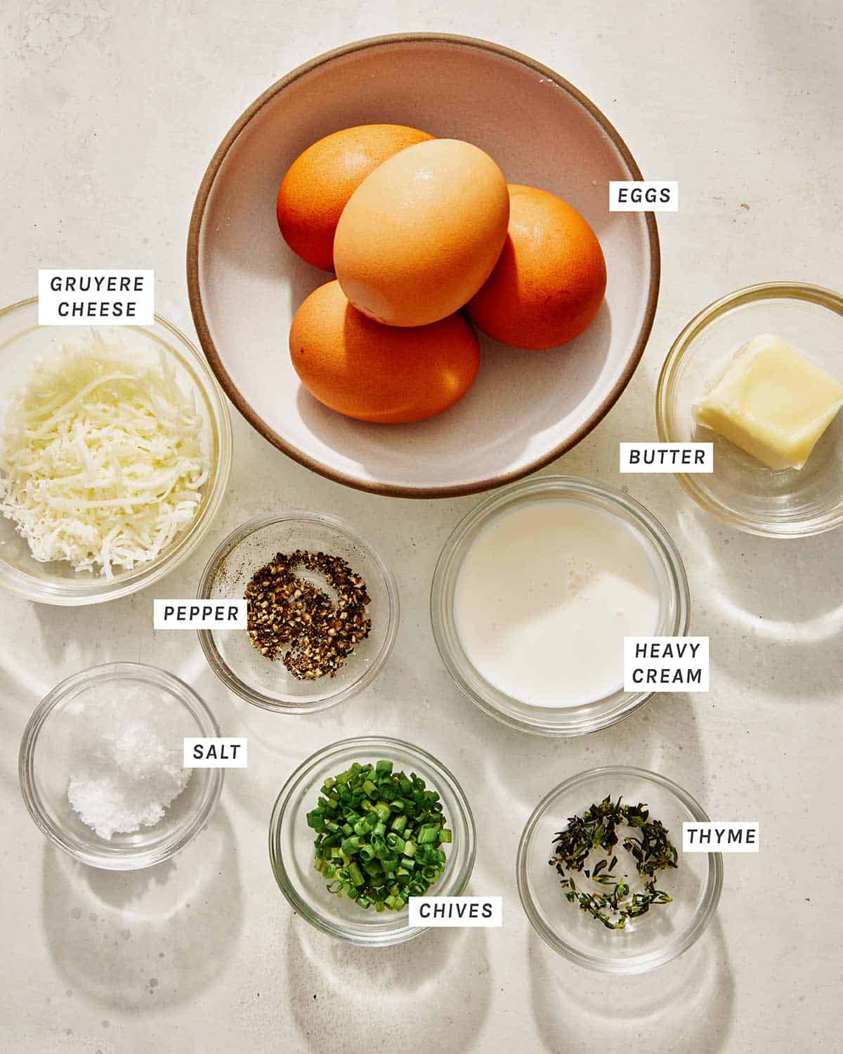 Ingredients to make baked eggs. 