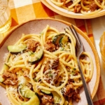 One pot pasta in a couple of bowls with a fork in it.