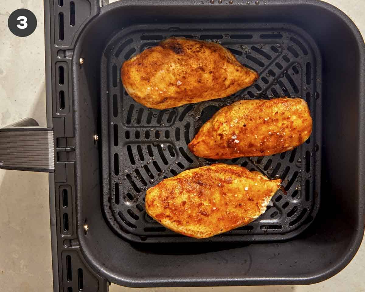 Air fryer chicken breast in an air fryer cooked. 