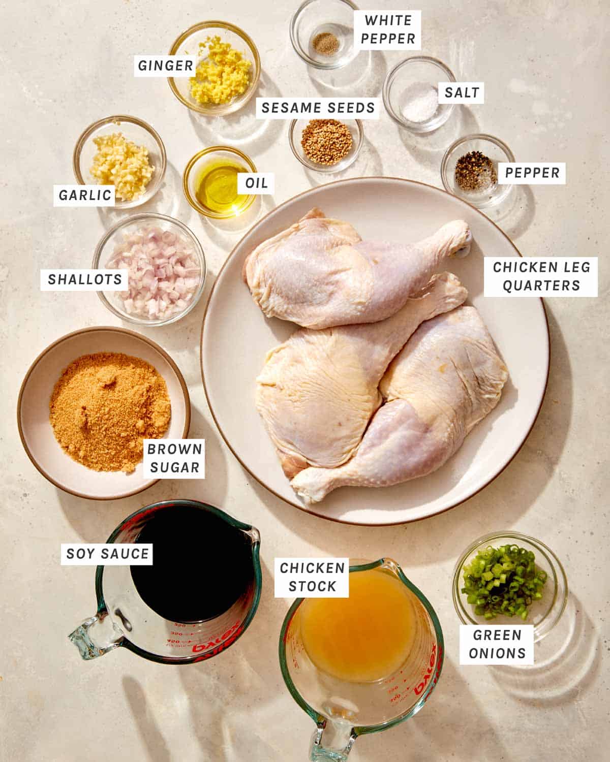 Garlic and ginger braised chicken ingredients on a kitchen counter. 