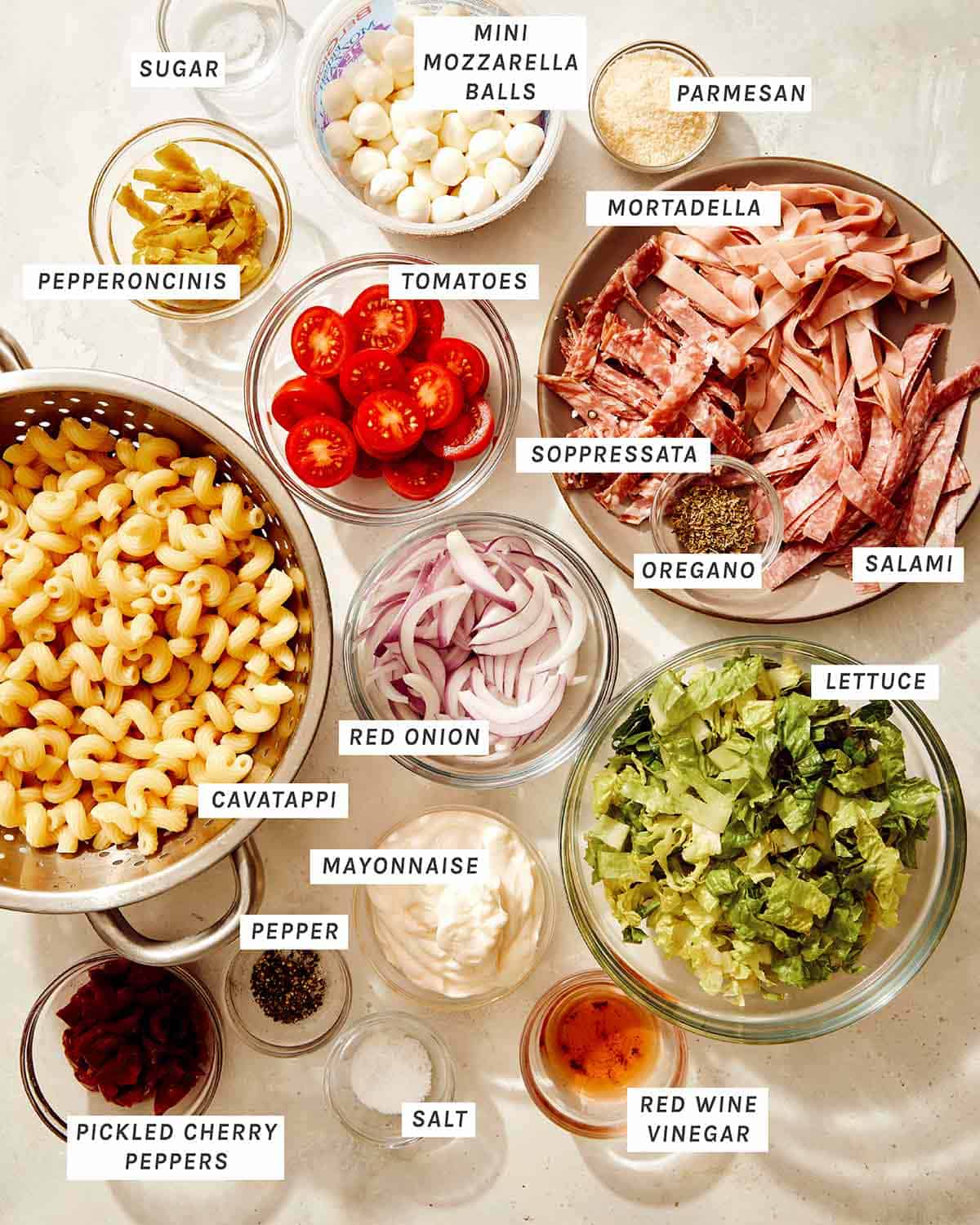 Grinder pasta salad ingredients all laid out to make the recipe. 