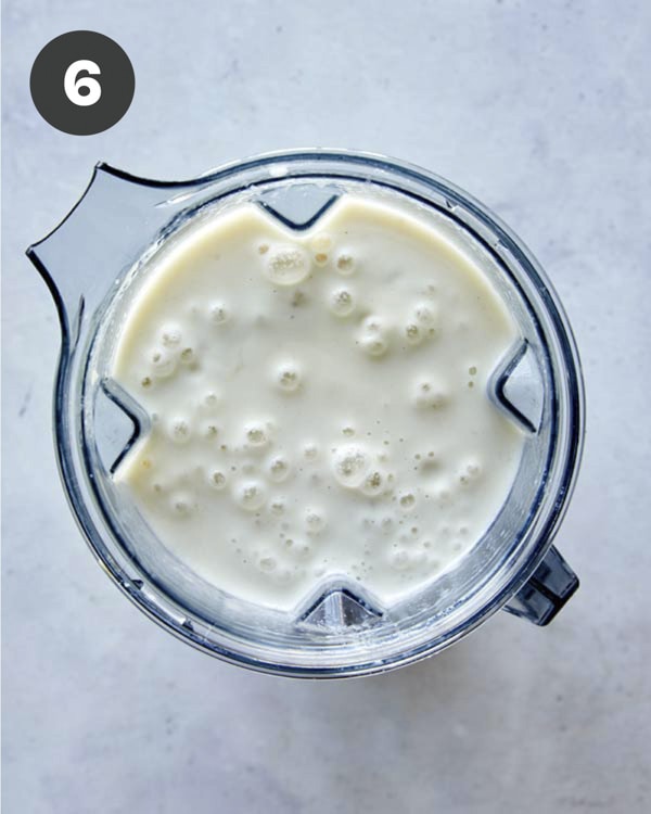 Loaded baked potato soup in a blender.