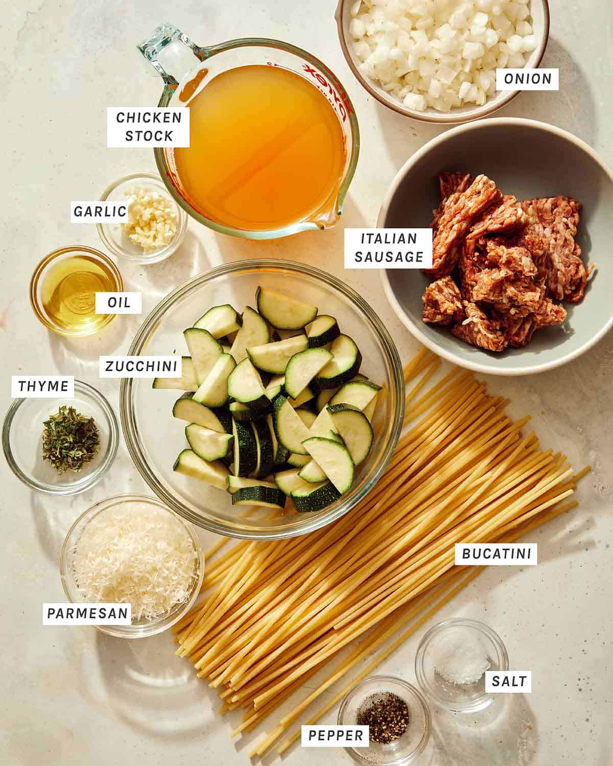 One pot pasta recipe ingredients on a kitchen counter. 