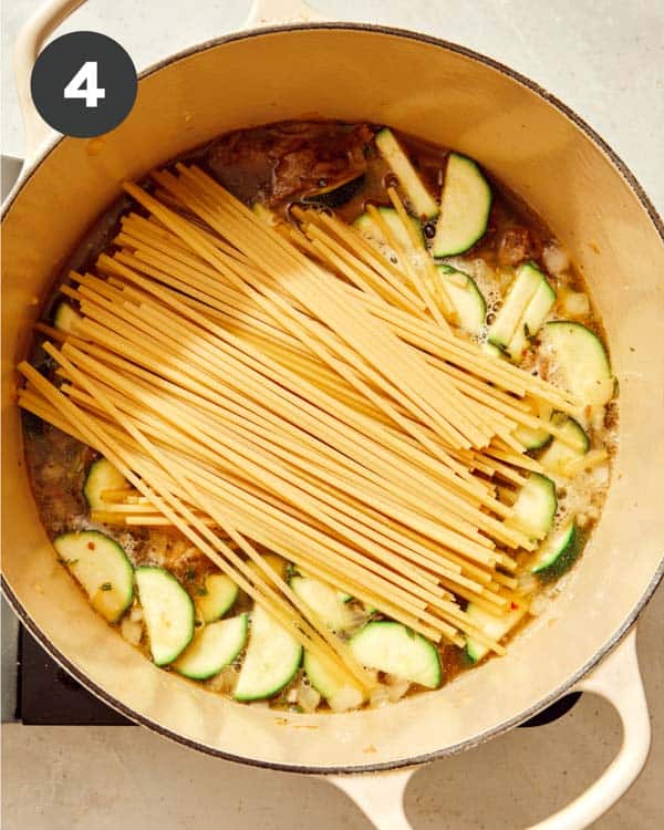 One pot pasta recipe cooking in a pot. 