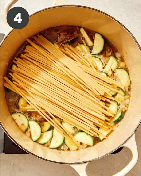One pot pasta recipe cooking in a pot.