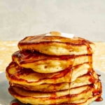 Buttermilk Pancake recipe with syrup poured on top.