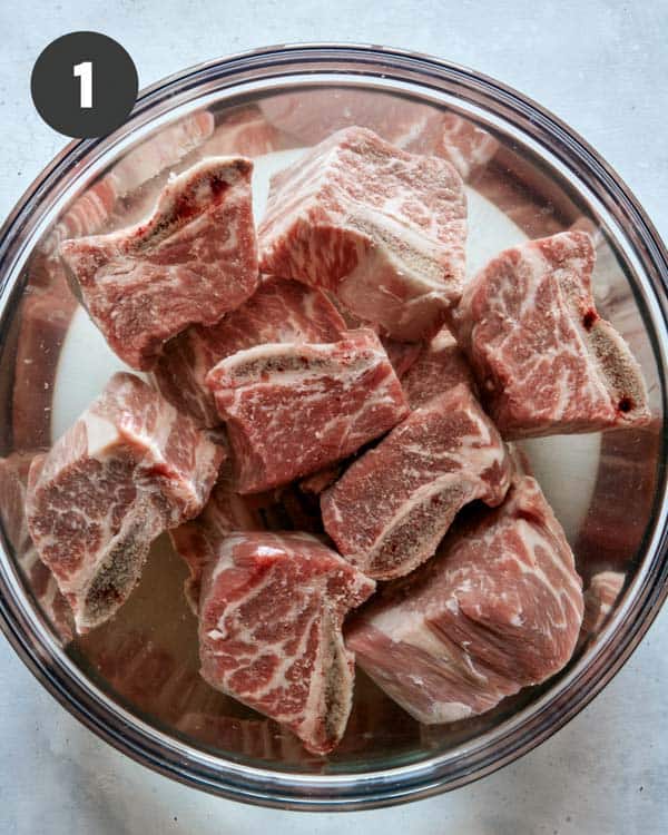 Short ribs for galbi jjim soaking in water.