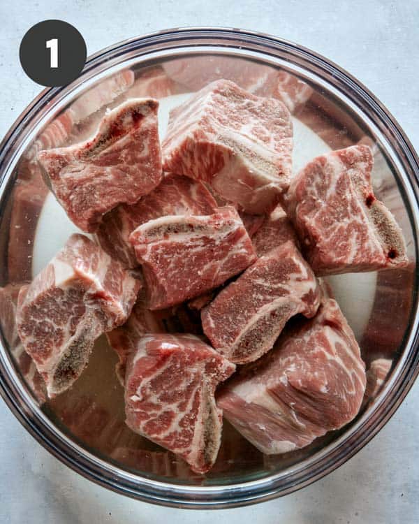 Short ribs for galbi jjim soaking in water. 