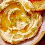 Whipped brie with honey and crostini on the side.