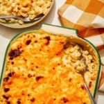 Baked mac and cheese close up in a casserole dish.