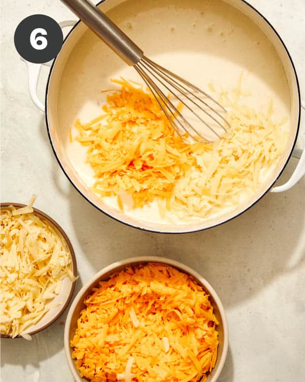 Making a cheese sauce in a pot. 