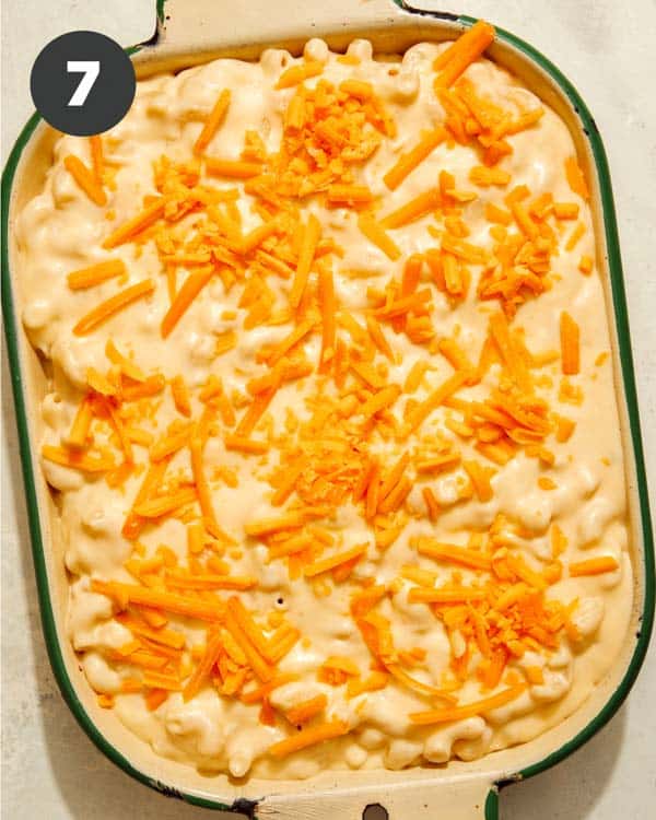 Mac and cheese in a casserole dish ready to be baked. 
