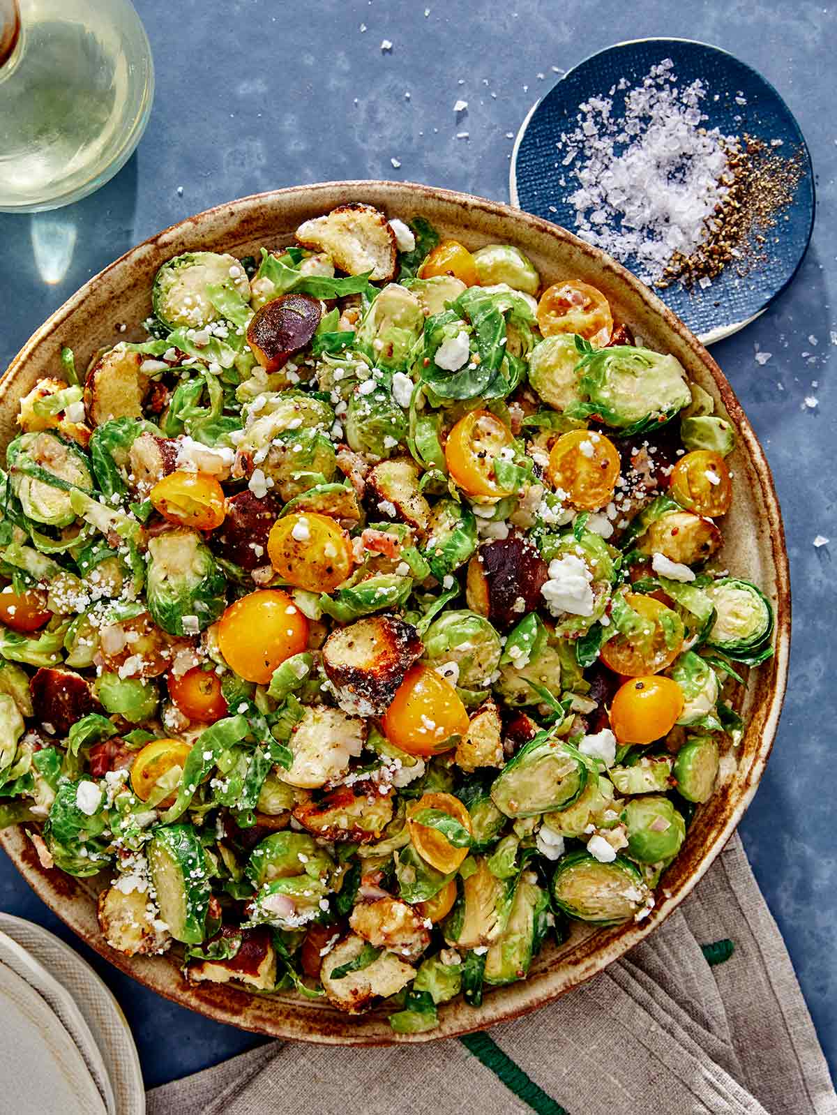 Shaved brussel sprout salad recipe in a big bowl. 