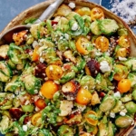 Brussel sprout salad recipe in a bowl close up.