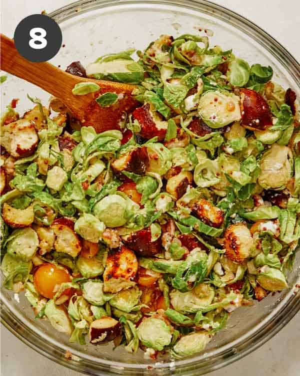 Brussel sprout salad in a big mixing bowl. 
