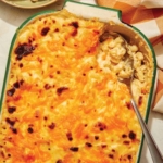 Baked mac and cheese close up in a casserole dish.
