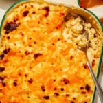 Baked mac and cheese close up in a casserole dish.