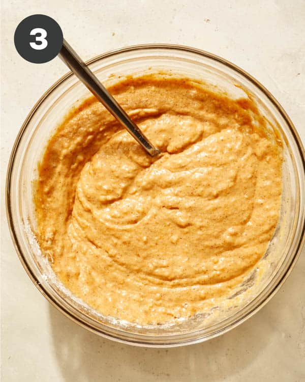 Pumpkin waffles batter in a bowl.