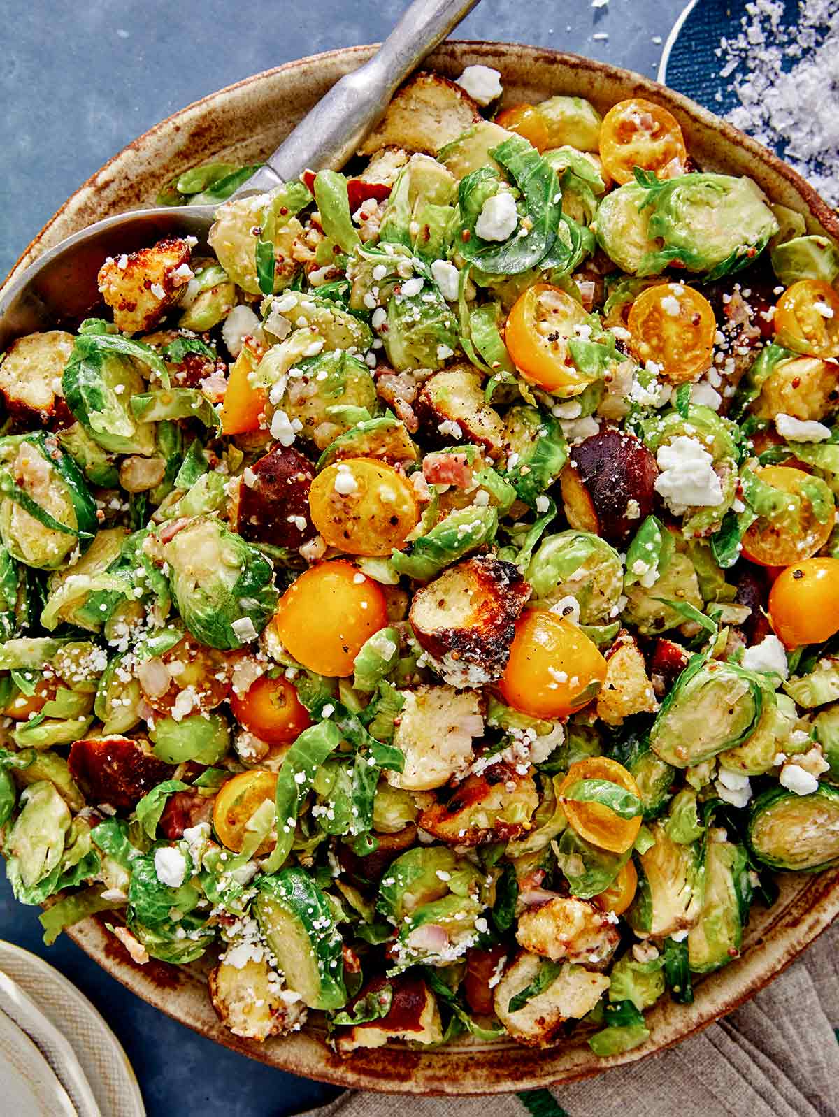 Brussel sprout salad recipe in a bowl close up. 