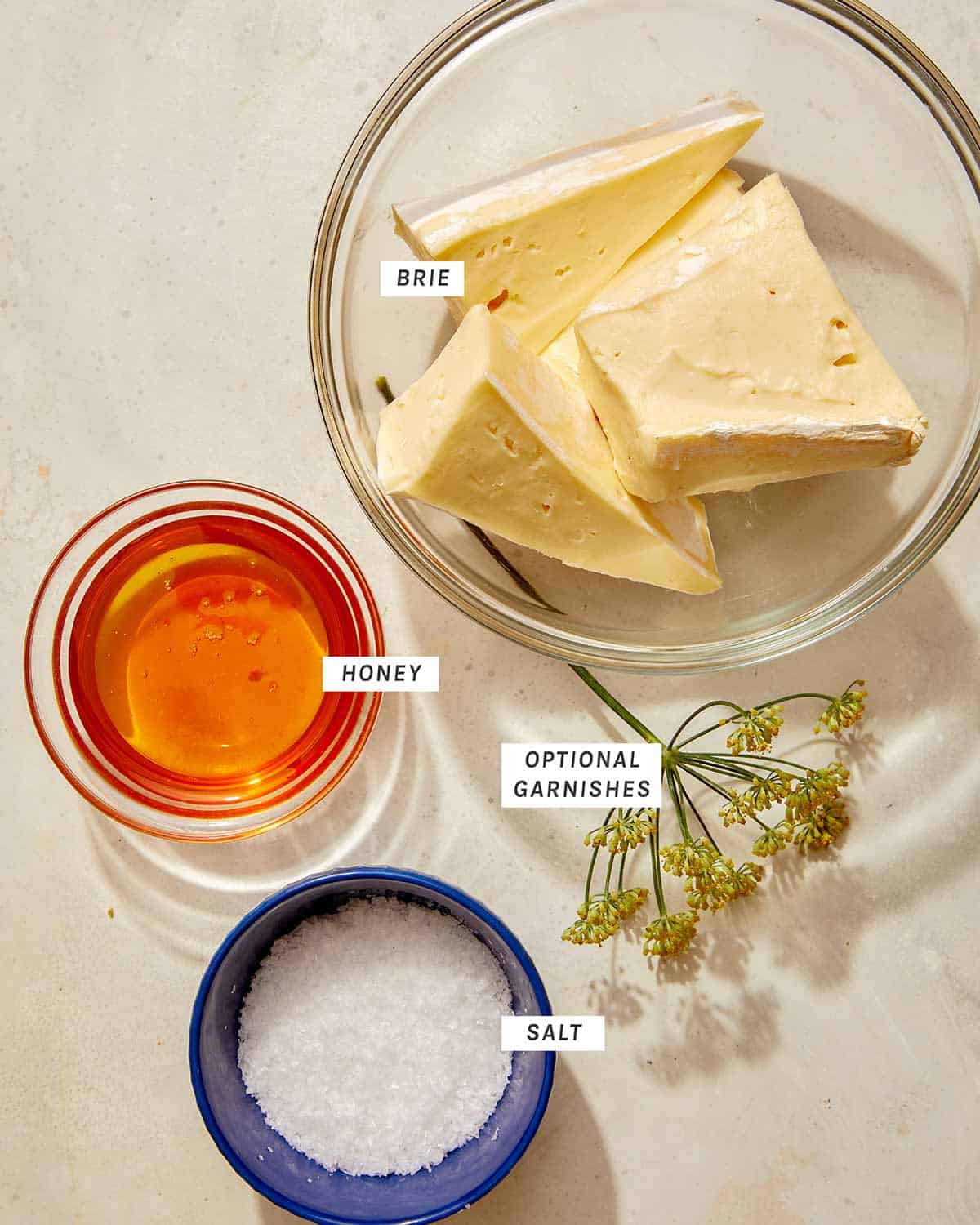 Whipped brie ingredients on a kitchen counter. 