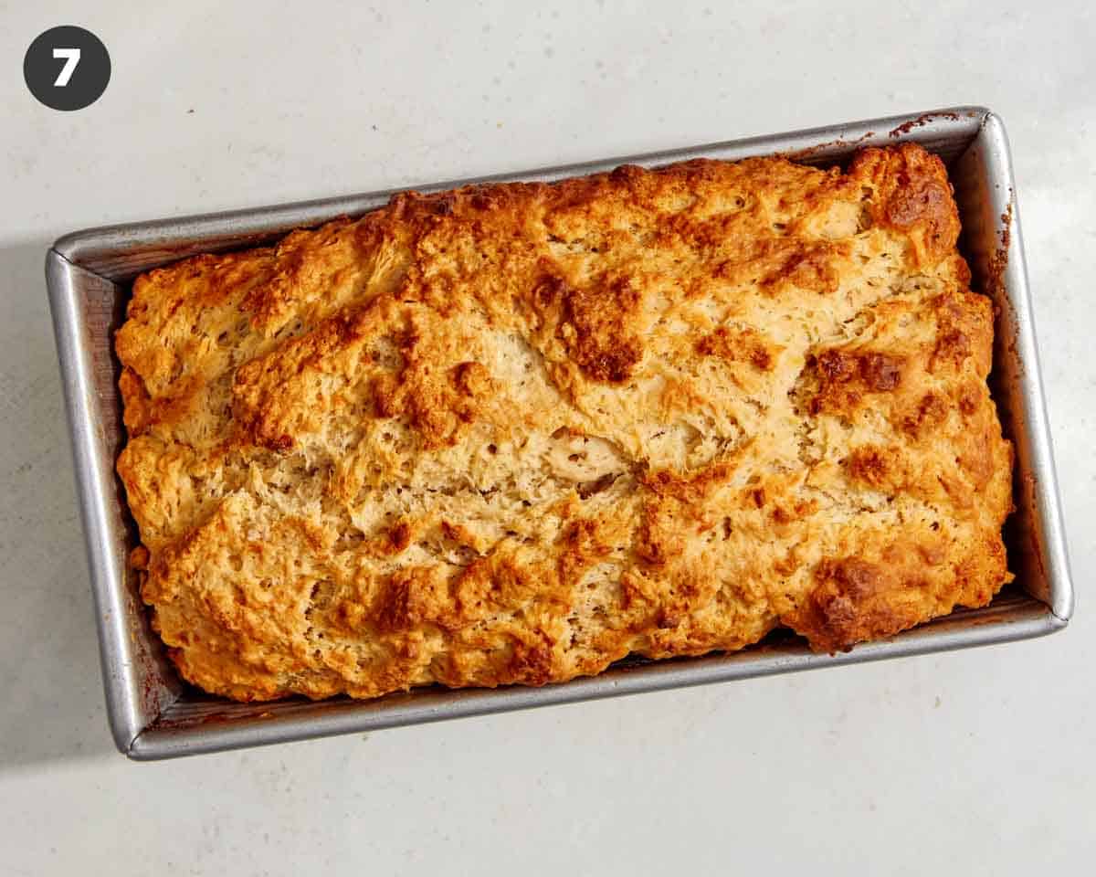 Freshly baked beer bread in a loaf pan. 