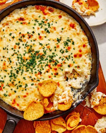 Creamed corn dip recipe with chips on the side.