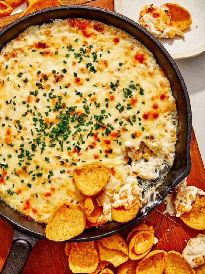 Creamed corn dip recipe with chips on the side.