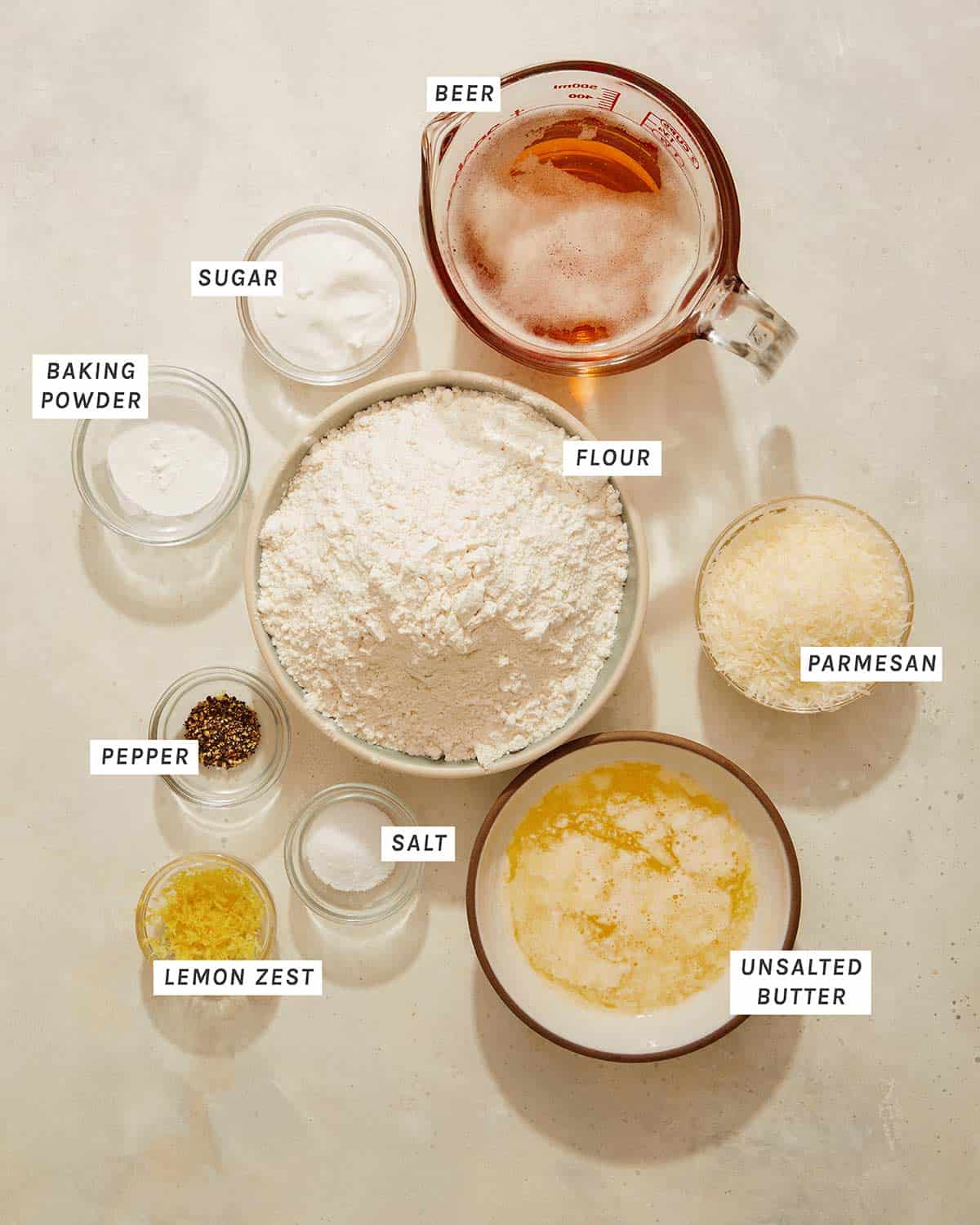 Beer bread ingredients measured and on a kitchen counter. 