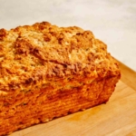 Beer bread on a cutting board.