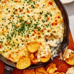 Creamed corn dip recipe with chips on the side.