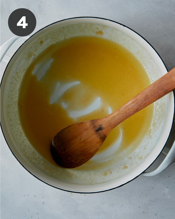 Butter whisked together with flour in a pot.