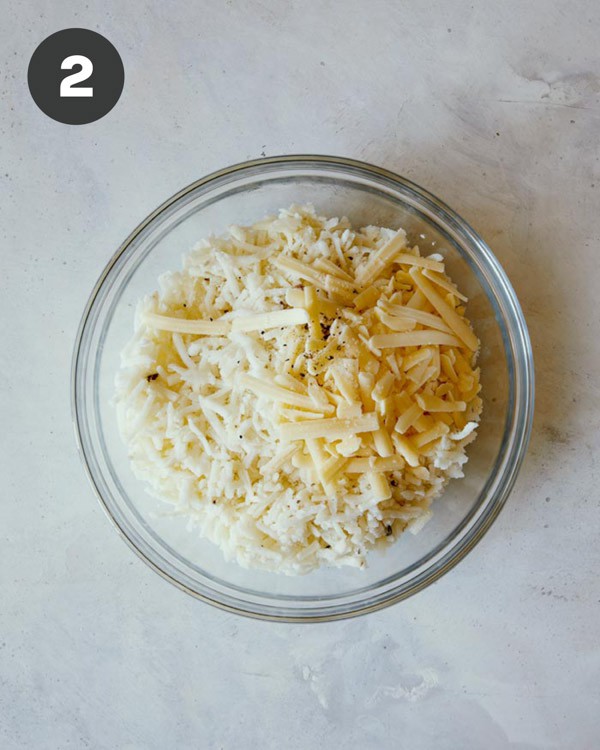 Hash brown ingredients in a mixing bowl. 