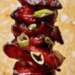 Close up on an air fryer chicken skewer.