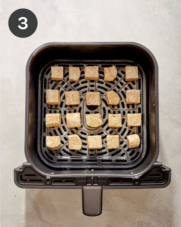 Tofu about to cooked in an air fryer. 