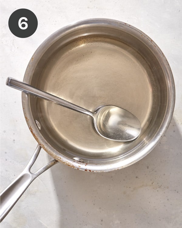 Sugar dissolved in a pot to make sweet chili sauce. 