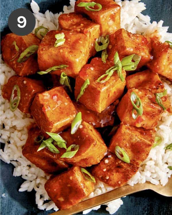 Crispy air fryer tofu with green onions on top. 
