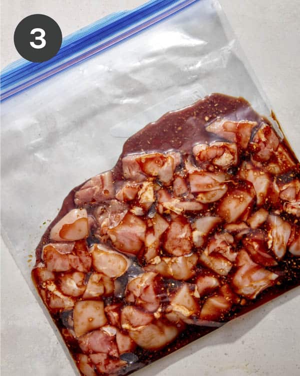 Chicken thighs in a bag with marinate.