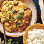 Chicken korma recipe with rice on the side.