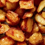 Crispy roasted potatoes close up.